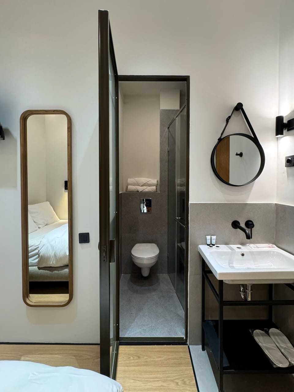 Shower, hair dryer, slippers, towels