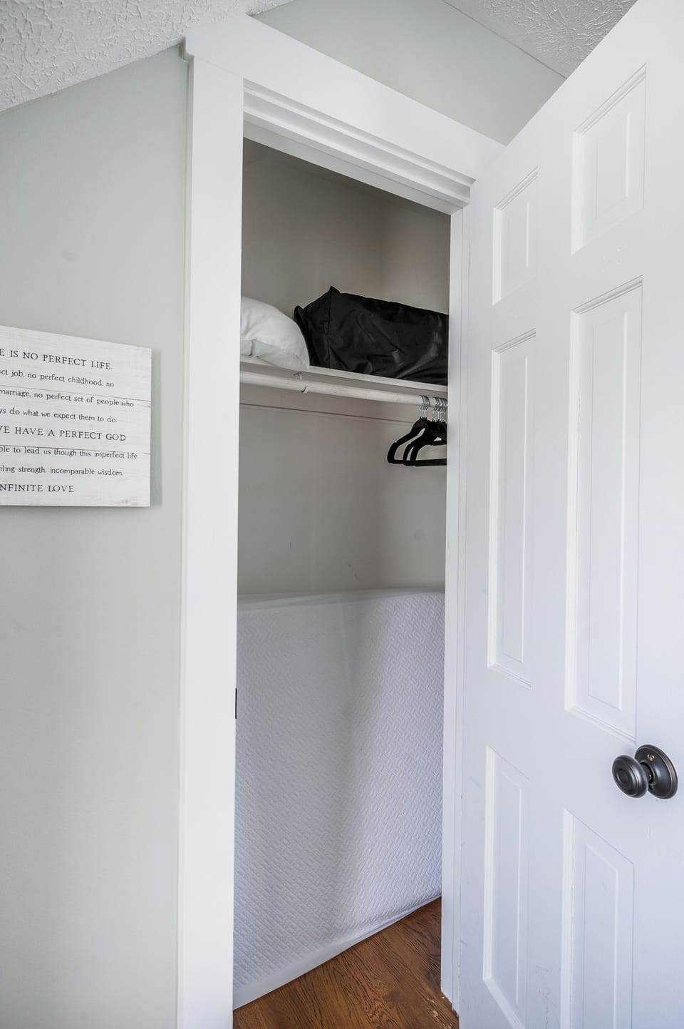 Bedroom #3 - guest closet w/ extra twin xl memory foam mattress & bedding that can be placed on the floor anywhere in the house for an extra sleeping spot (great for kids), velvet hangers, and luggage rack