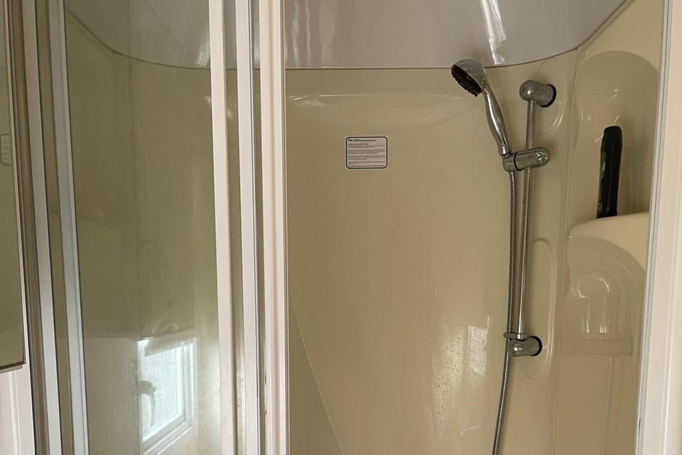 Shower, free toiletries, hair dryer, toilet paper