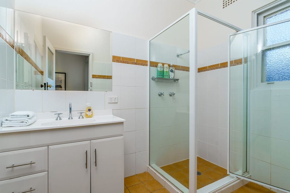 Refresh in our well-appointed bathroom, designed for comfort and convenience. With modern fixtures and a clean, inviting atmosphere, it offers a relaxing space to start or end your day.
