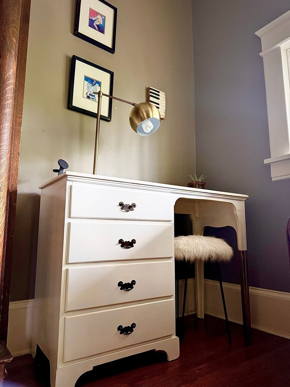 Cozy, light-filled workspace with vintage desk, fast Wi-Fi & charming decor.