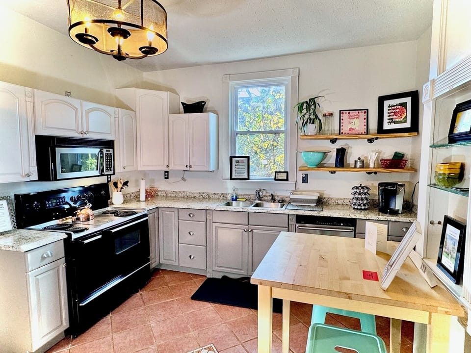Fully stocked kitchen with modern tools—great for families & long stays.