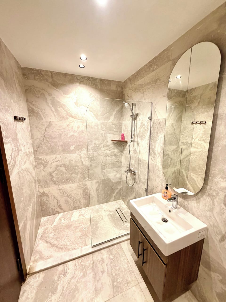 Separate tub and shower, hair dryer, slippers, bidet
