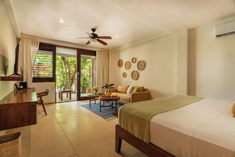 Junior Room, Pool View | Minibar, in-room safe, free WiFi, bed sheets