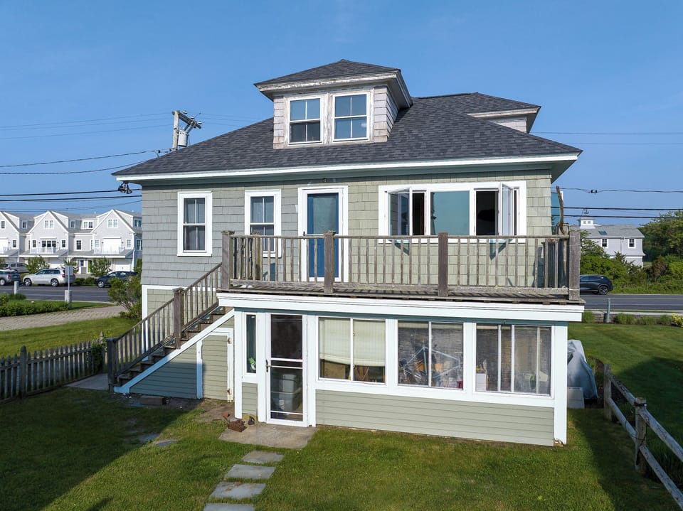 back of the building as you walk back from the beach - you apartment door will be on the front side of the building 