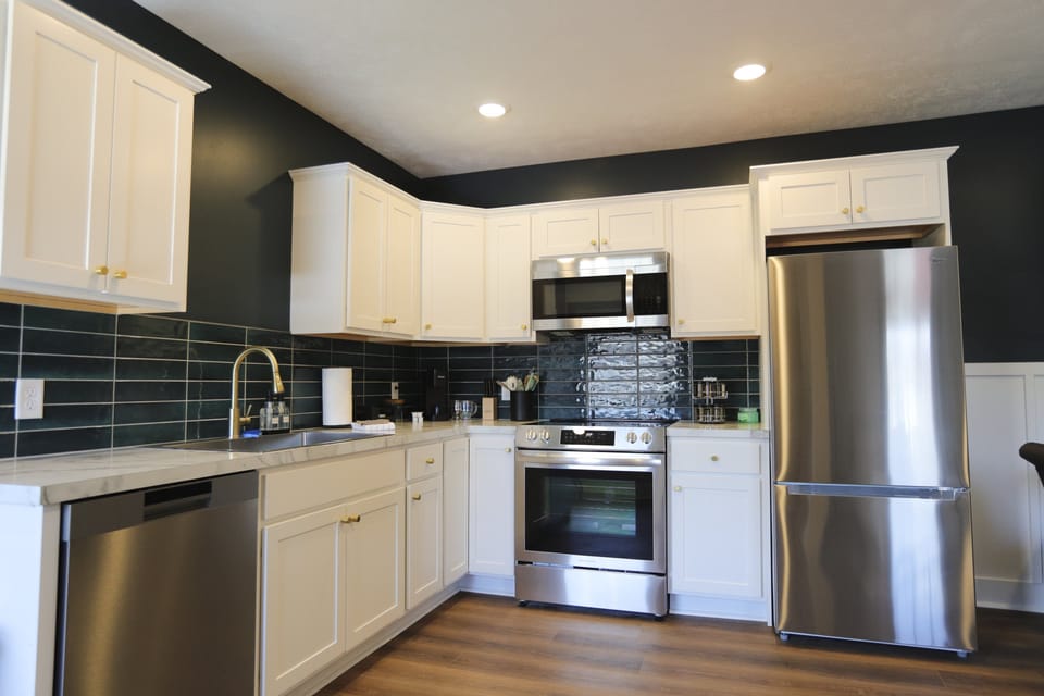 Queen 300 sq. ft. Studio at the Victorian Unit B living area and kitchen