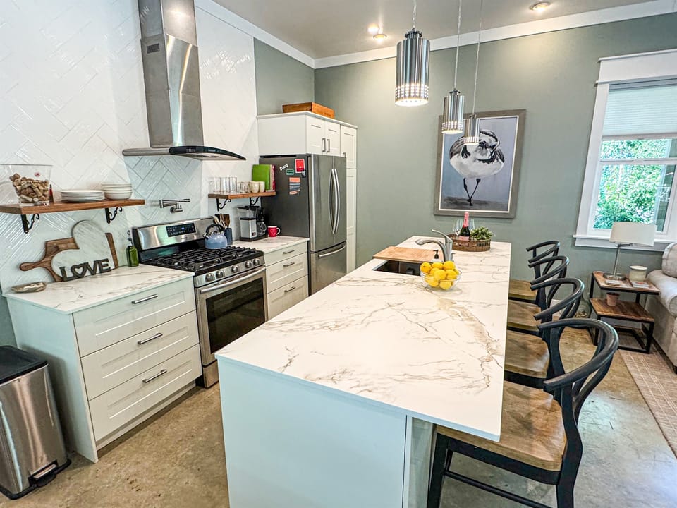 The kitchen island seats four generously, with room left over for meal prep and/or playing games.
