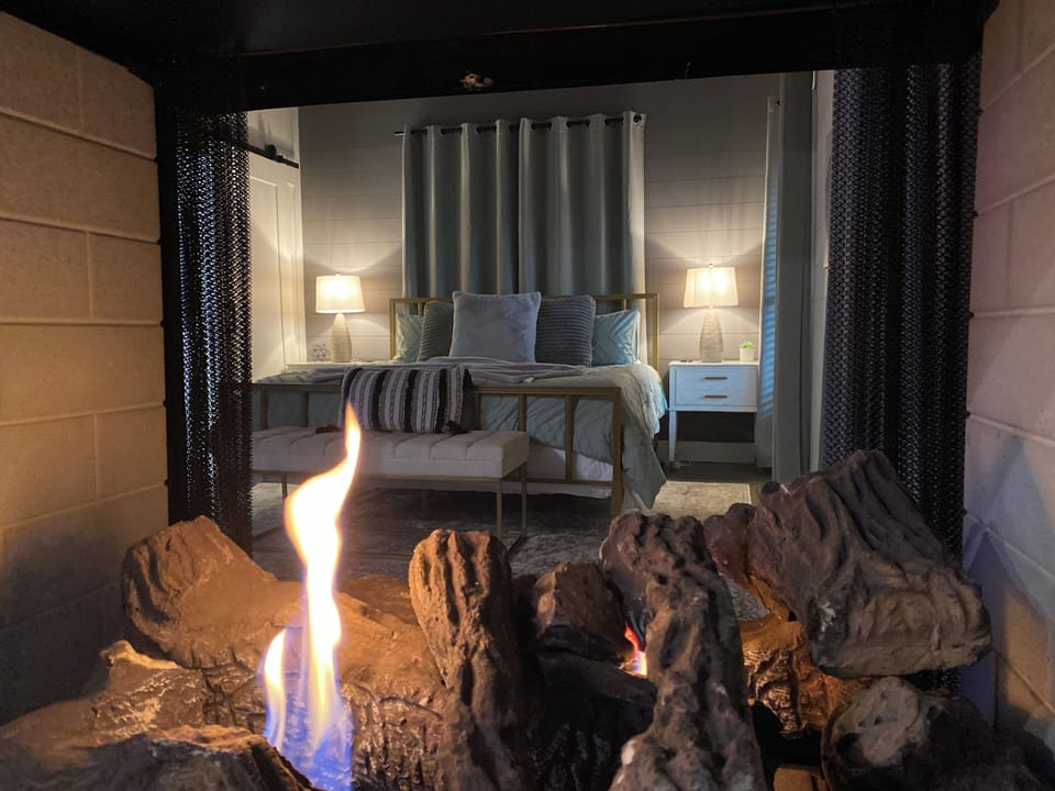 Cozy up by the fireplace and drift into peaceful slumber in your dream bedroom.