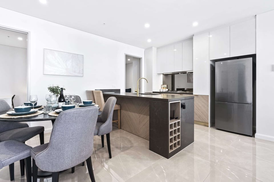 Dining area is right next to the fully equipped modern kitchen