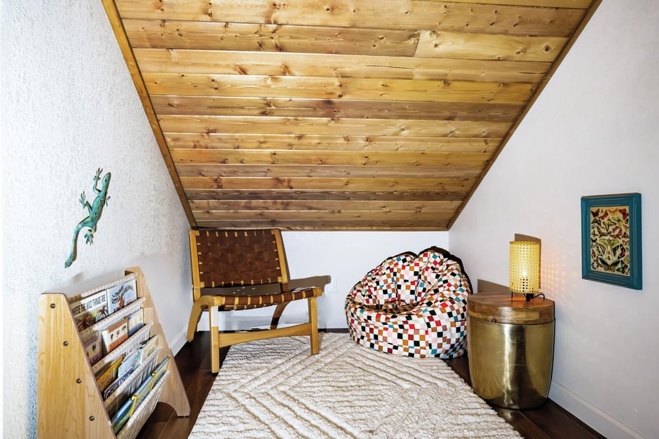 Childrens play loft with space for reading books and coloring. 