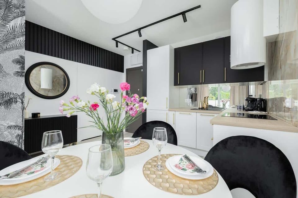 The living room's sleek design is both functional and aesthetically pleasing.