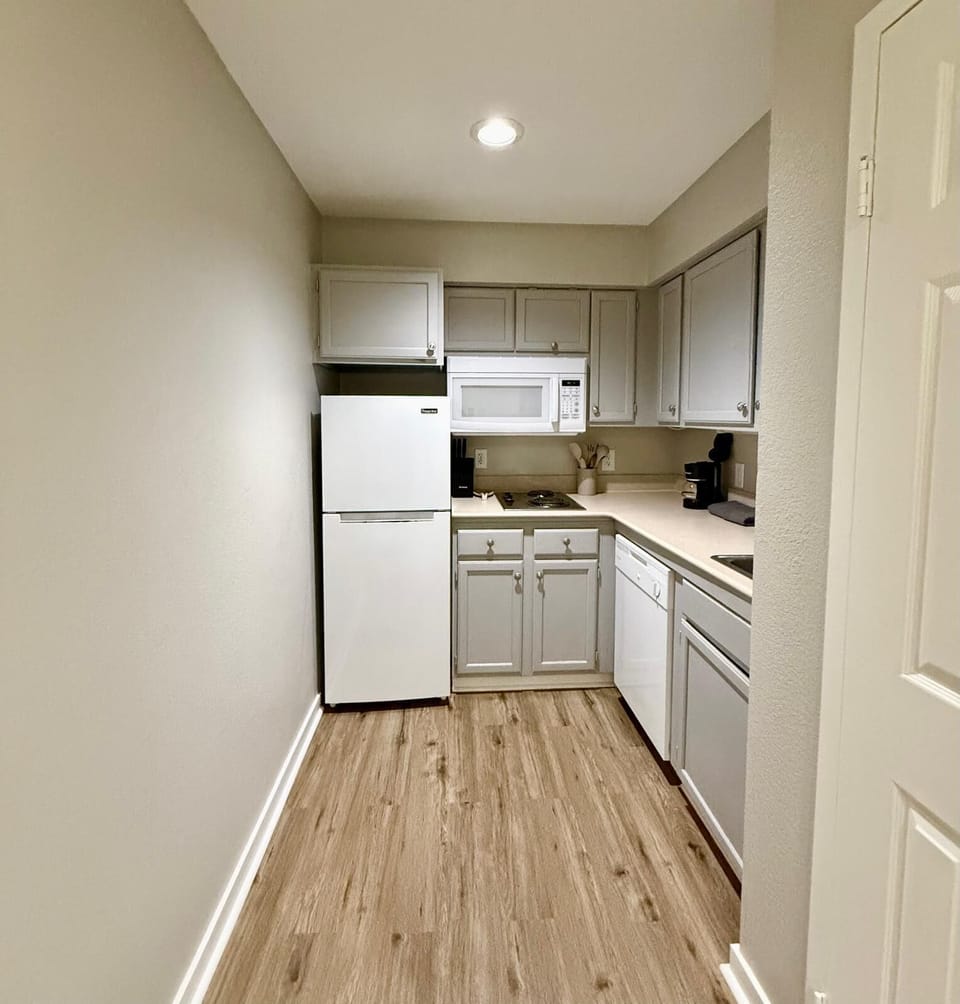 Fuel your day from this smartly arranged kitchen.