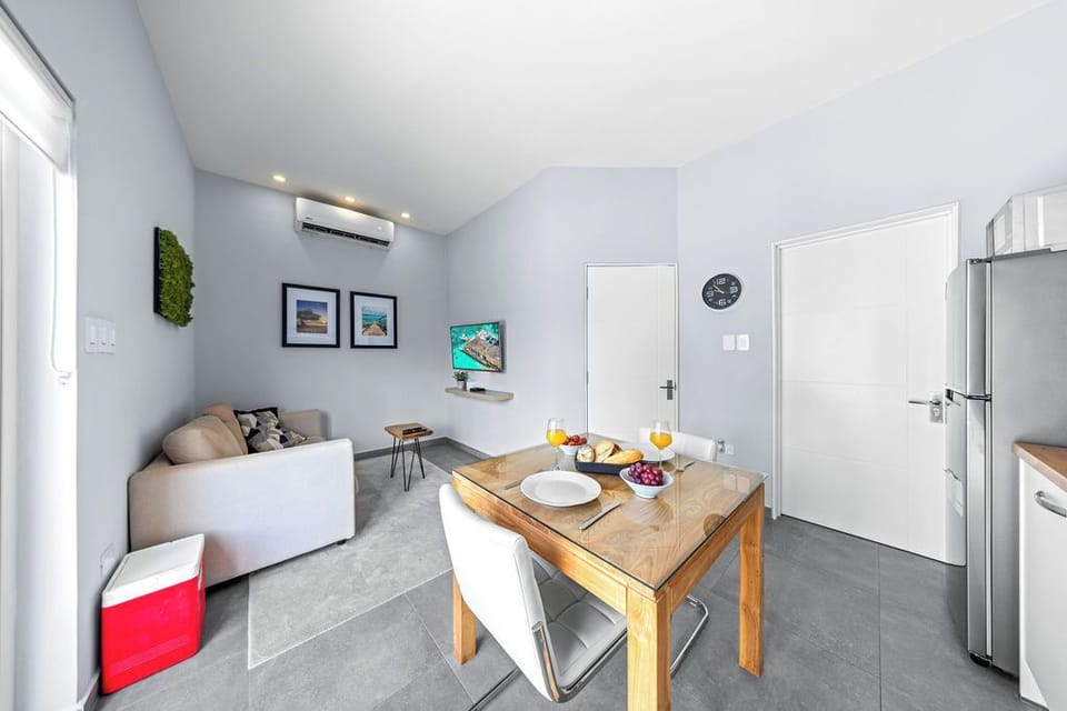 Cook and dine in style in this charming kitchen with a perfect setup for two.
