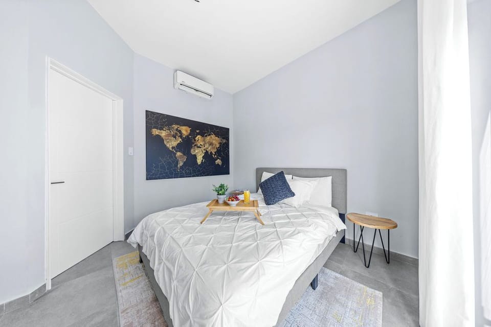 Sleep soundly in this inviting queen bed, where comfort meets charm.