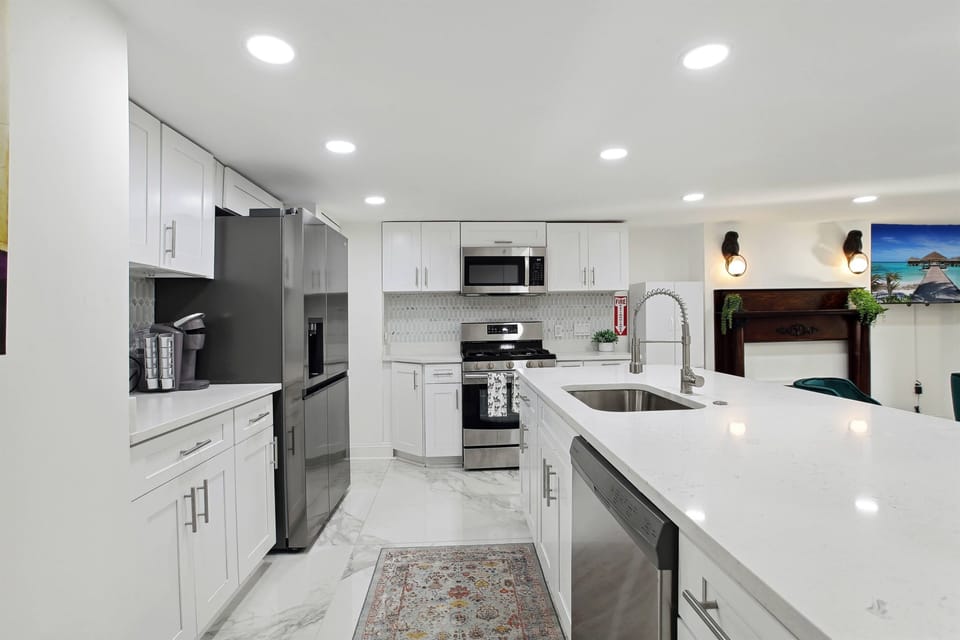 The kitchen is fully equipped with new appliances and all the utensils, pots and pans needed to whip up a meal