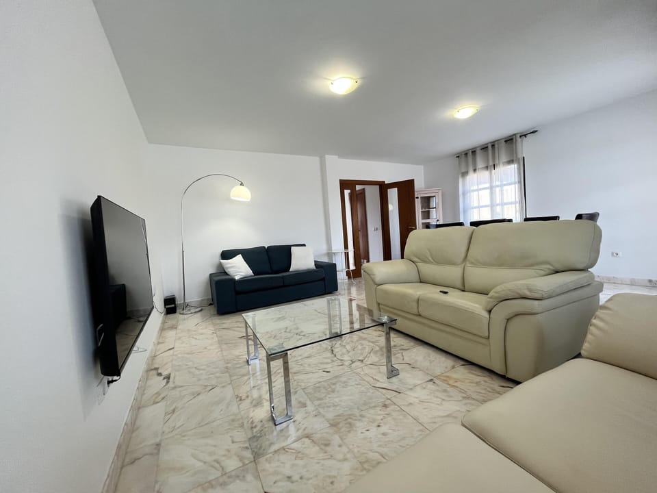 Villa | Living area | TV, fireplace