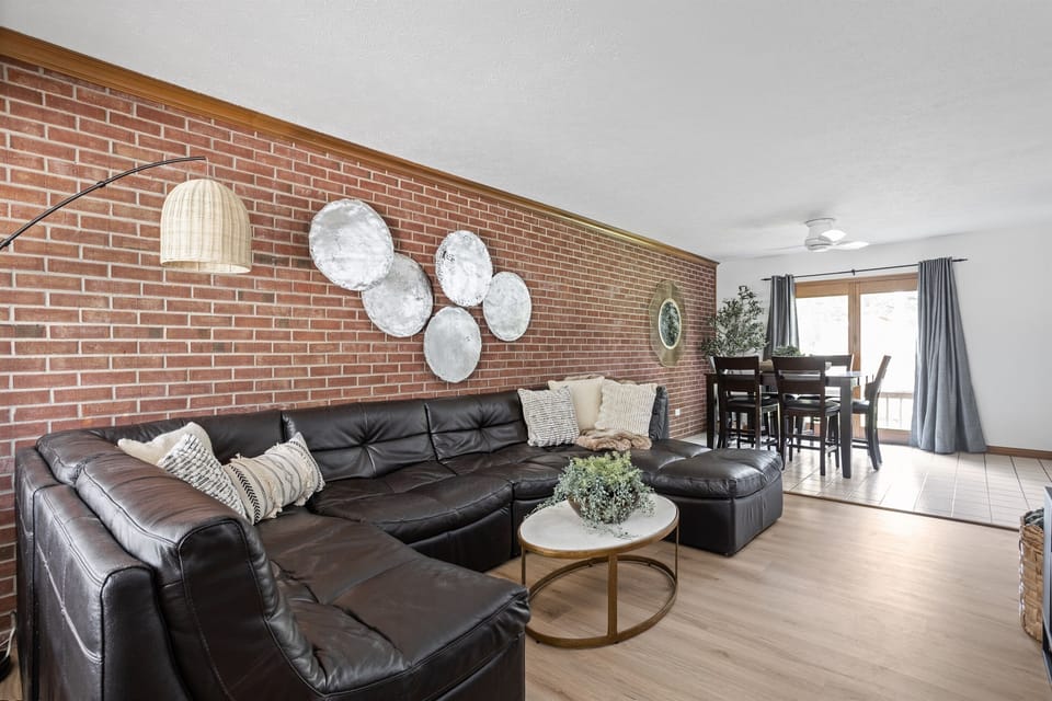 Sink into the big, comfy couch and unwind while watching your favorite shows on the large TV – the perfect spot to relax after a day of adventure.