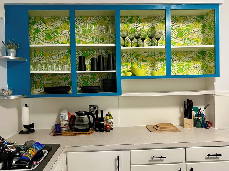 1970's refurbished kitchen.  Original psychedelic paper completes the design.