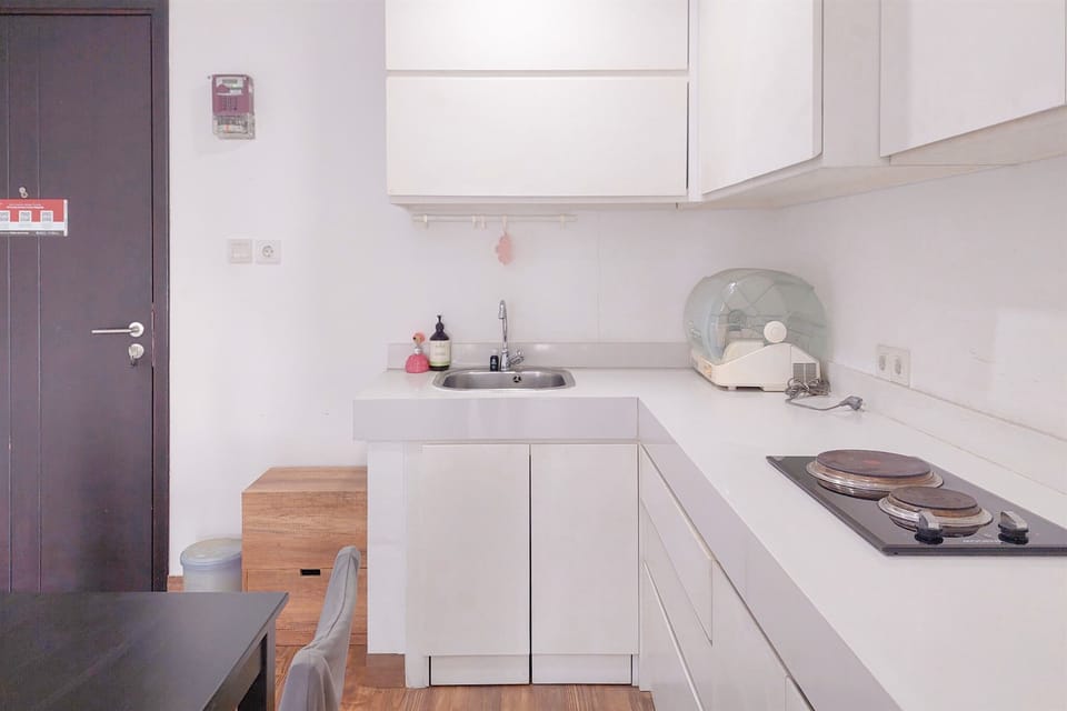 Apartment | Private kitchen | Fridge, stovetop, rice cooker, dining tables