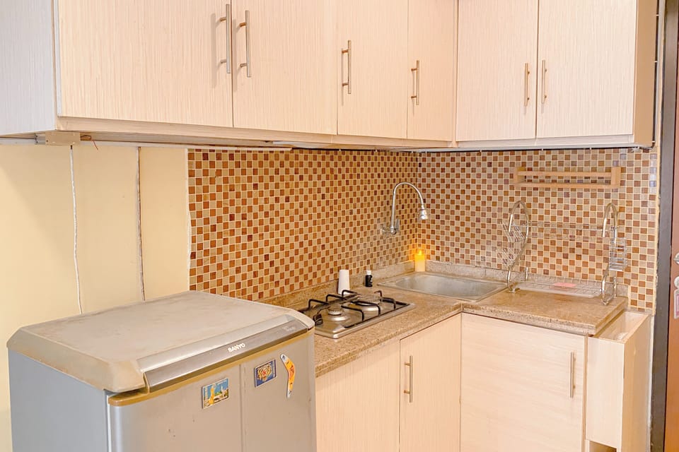 Apartment | Private kitchen | Fridge, stovetop, rice cooker, dining tables