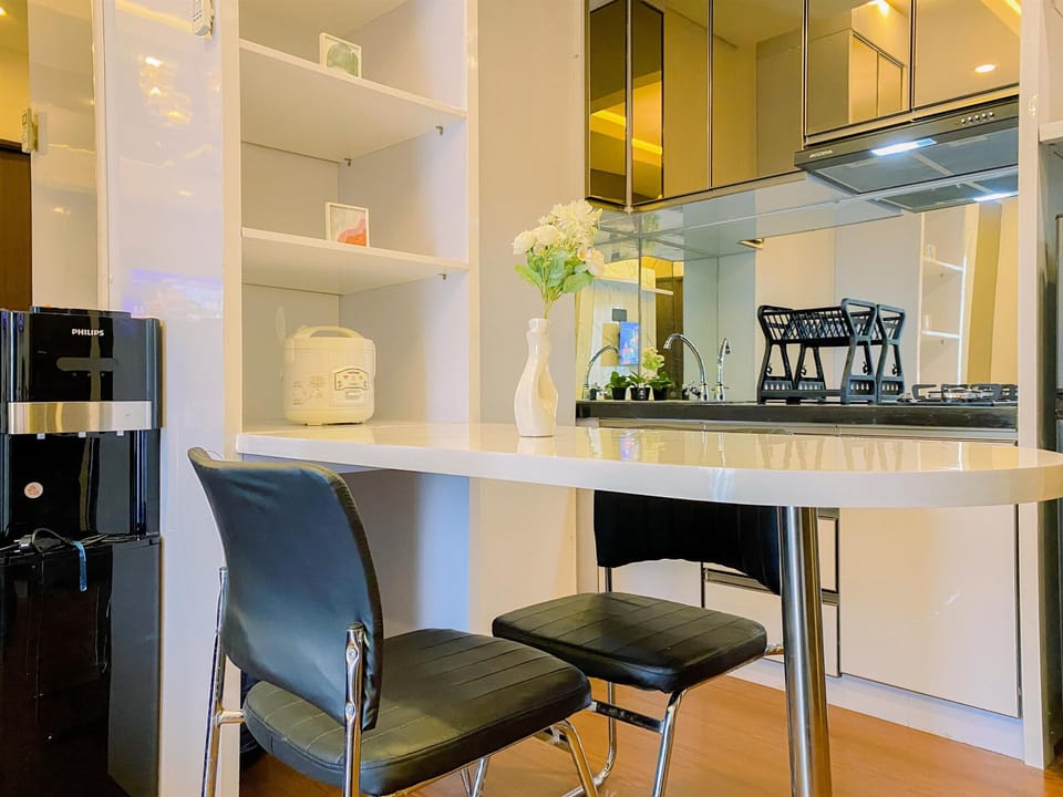 Apartment | Private kitchen | Full-size fridge, stovetop, rice cooker, dining tables