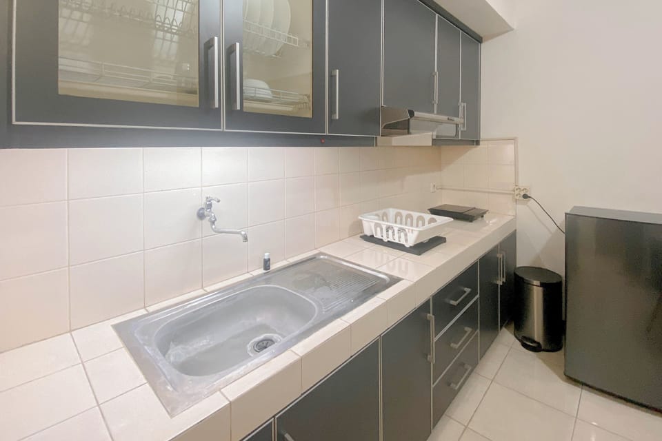 Apartment | Private kitchen | Fridge, stovetop, rice cooker, dining tables