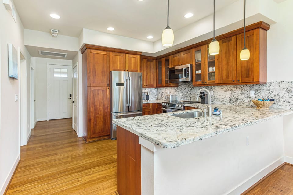 Kitchen is bright and has enough counter space to prepare meals