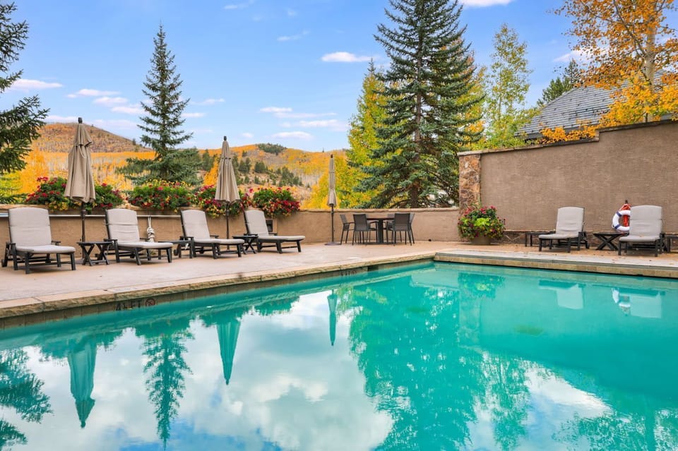 The inviting pool area offers a perfect escape, ideal for lounging in the sun.