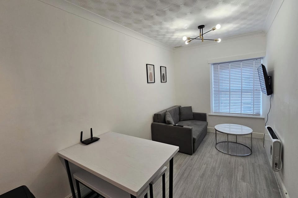 Whether you're watching TV, reading a book, or simply lounging, the living room offers a warm and homely vibe that makes it easy to settle in and feel at ease.