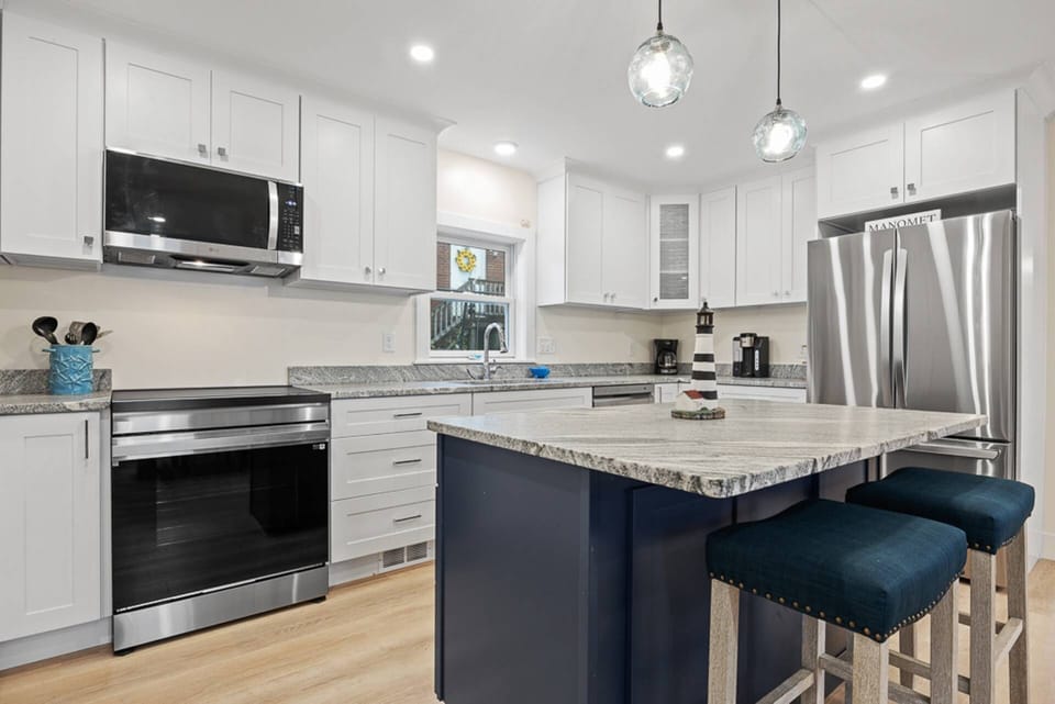Another view of the kitchen with modern appliances