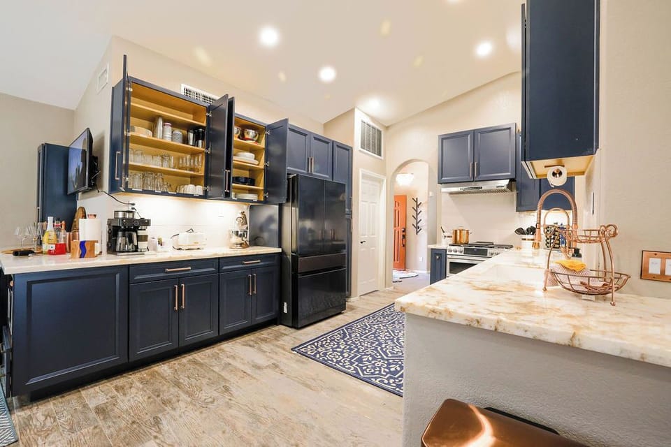 Kitchen with refrigerator, Ninja coffee center, kitchen aid mixer, toaster