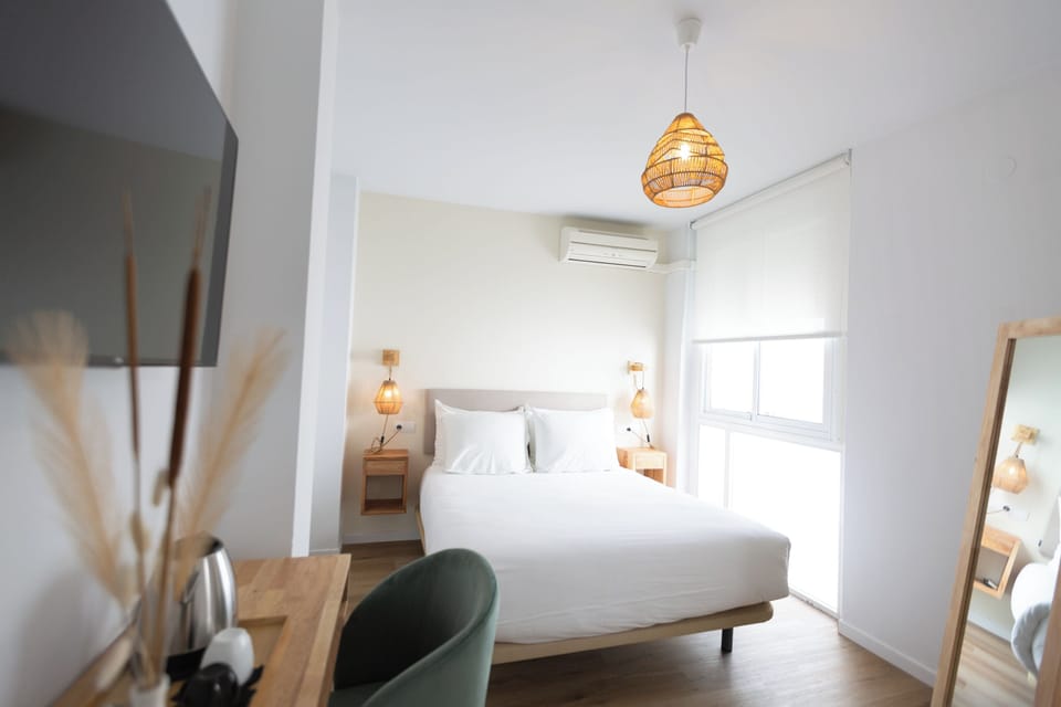 Standard Double Room | Desk, laptop workspace, blackout drapes, iron/ironing board