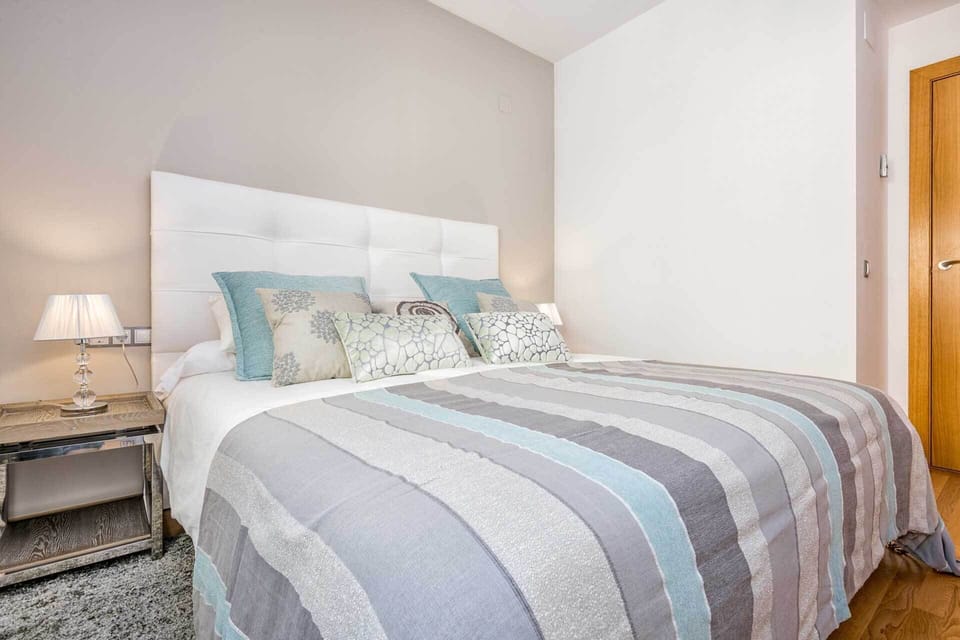 2 bedrooms, down comforters, iron/ironing board, cribs/infant beds