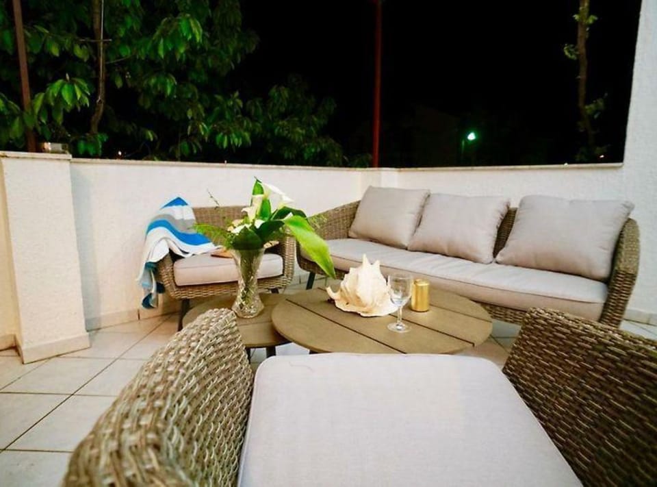 Apartment (Three Bedroom Apartment with Terrace) | Living room | 32-inch flat-screen TV with digital channels