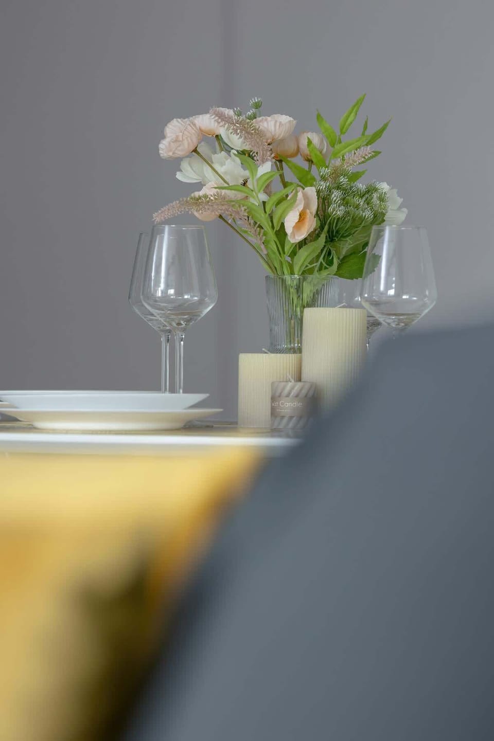 Dining table with tableware.
