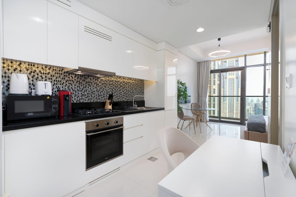 Panoramic Apartment | Private kitchen | Fridge, microwave, oven, stovetop