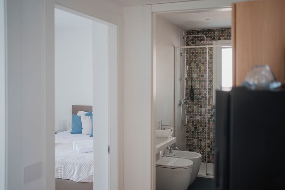 Junior Double or Twin Room, Sea View | Minibar, in-room safe, blackout drapes, soundproofing