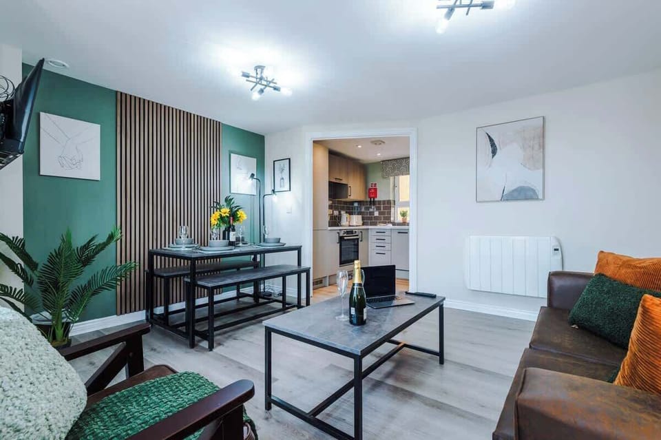 The open-plan living room, dining area and kitchen benefit from a comfortable double sofa-bed, 40-inch SMART TV on a movable bracket & dining table that can comfortably seat 6.