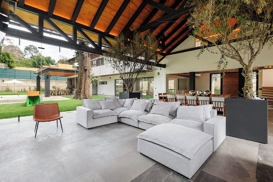 Premium House | Living room | 50-inch flat-screen TV with digital channels, fireplace