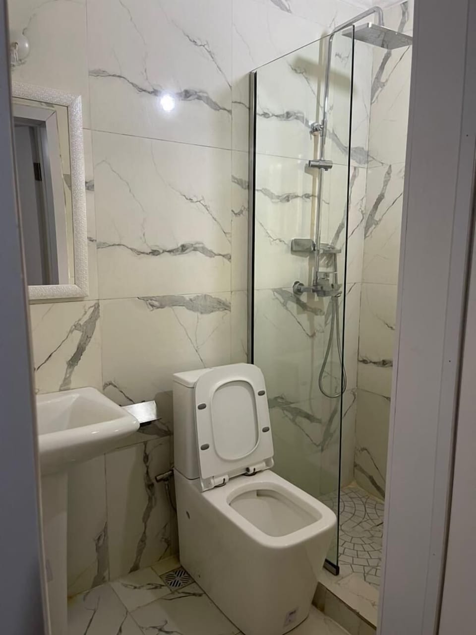 Shower, free toiletries, towels, soap