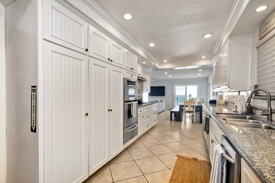 View from kitchen to dining area to ocean
