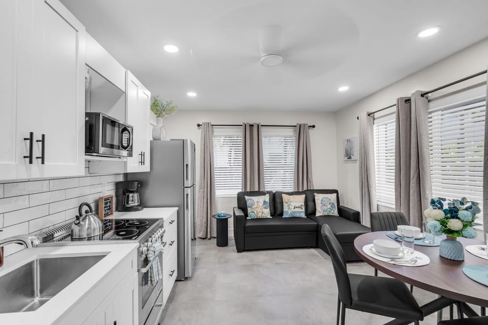 Relax in the living room with a Smart TV, natural light, and a sofa that converts into a bed for extra guests.