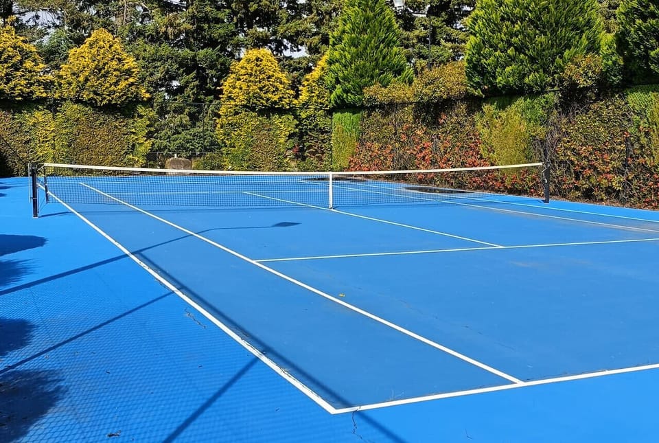 You get free use of the resort tennis court, balls and rackets are supplied.