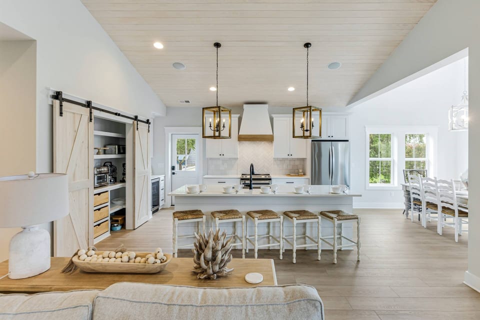 Our kitchen island is the ideal spot for meal prep, casual dining, and socializing with friends and family.