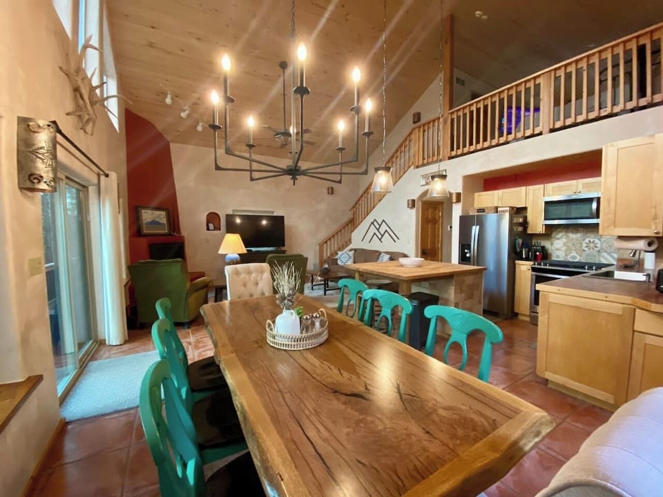 Dining table seats 8, extra seating at kitchen island