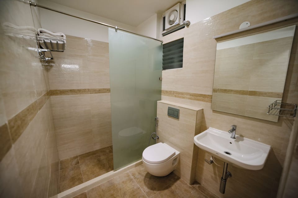 Shower, free toiletries, hair dryer, towels