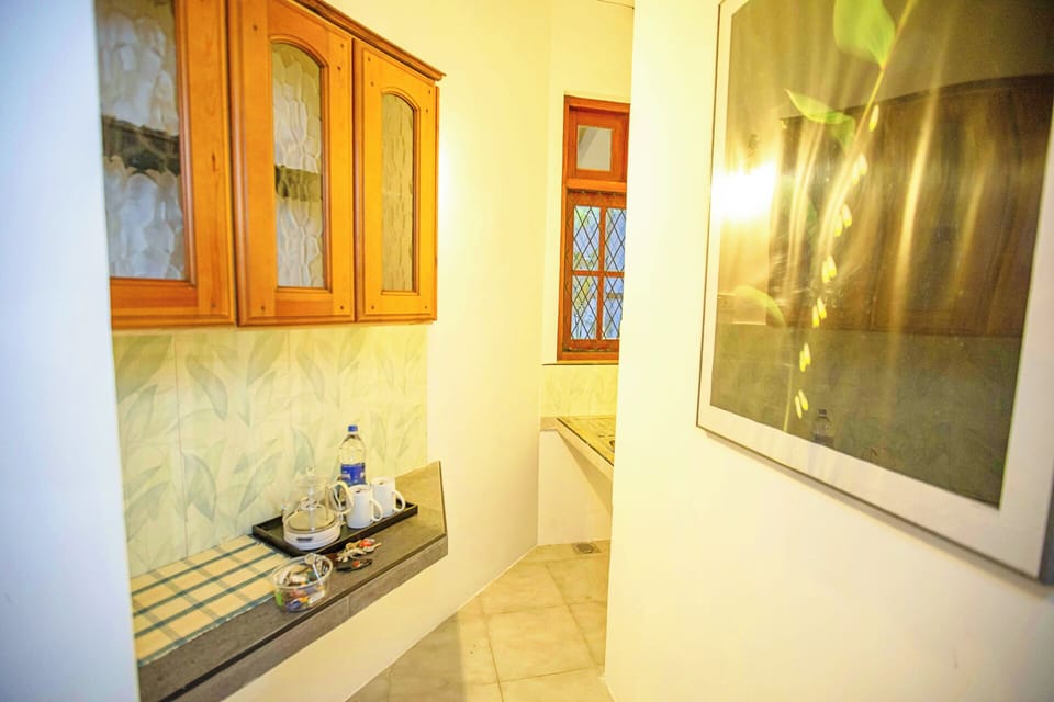 Double Room, Garden View | Private kitchenette | Shared fridge, microwave