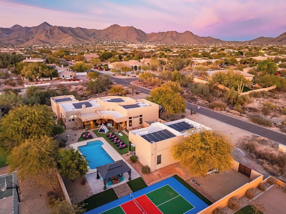 Enjoy a private pickleball court, heated pool, hot tub, and lawn games at our family mountain home getaway!