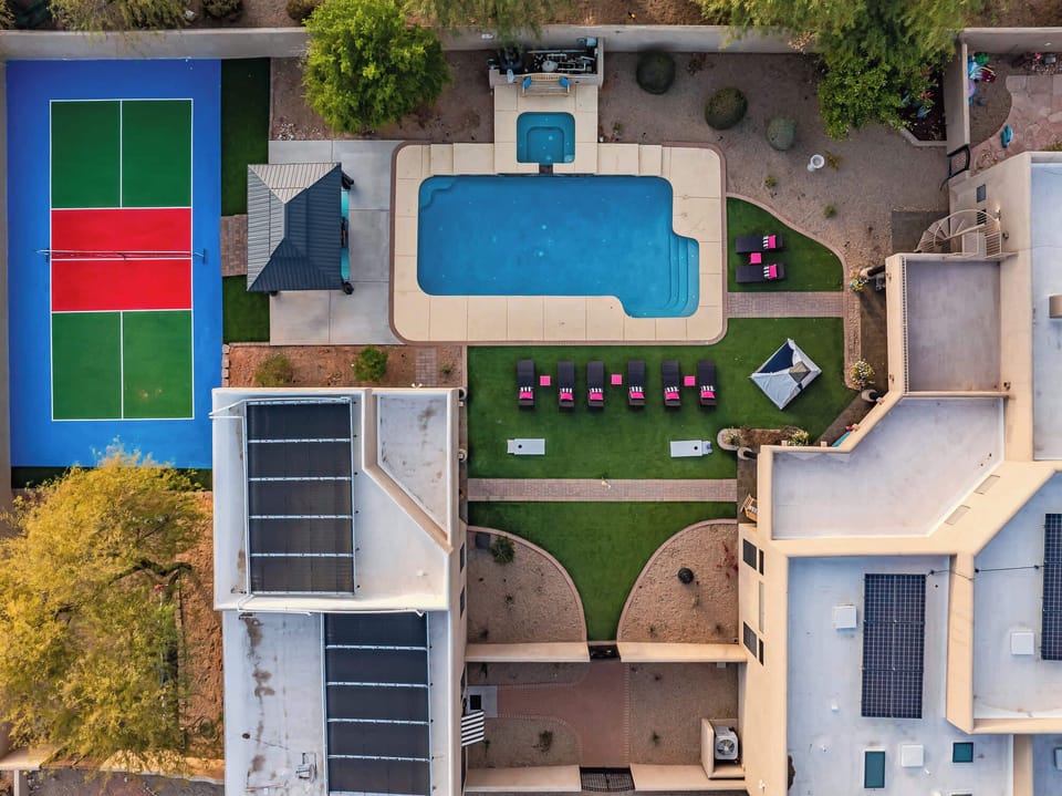Enjoy a private pickleball court, heated pool, hot tub, and lawn games at our family mountain home getaway!