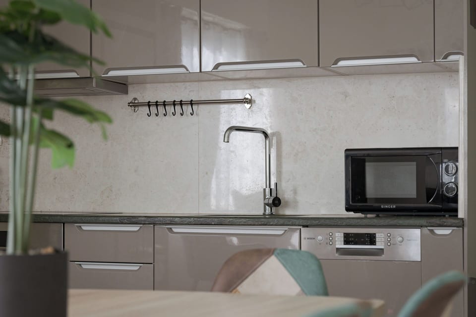 Family Apartment | Private kitchen | Espresso maker, coffee/tea maker, full-size fridge, microwave